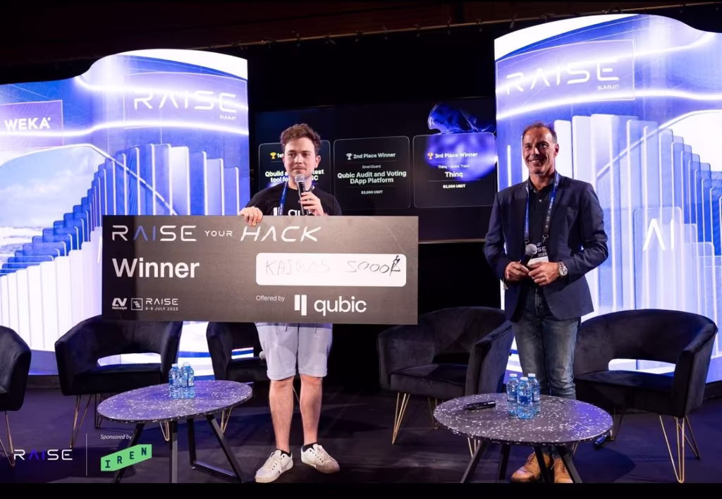 Kairos Tek team receiving 1st place award at Raise Your Hack 2025 — $200K Qubic incubation